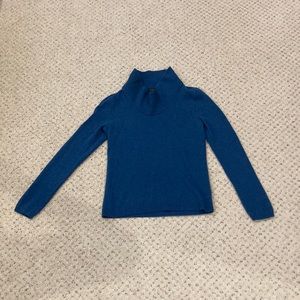Woman’s Blue Sweater